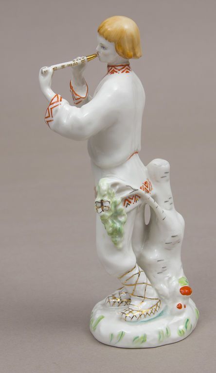 Antique Porcelain figurineLel (Young man with a pipe)