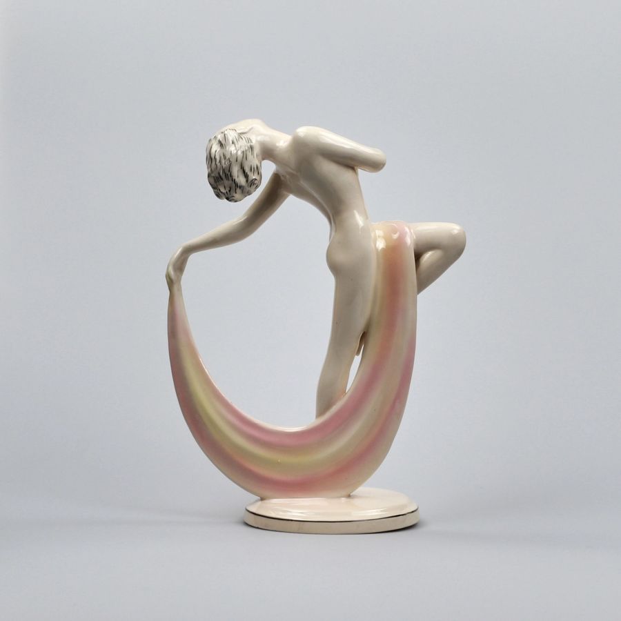 Antique Figurine of a dancer in the Art Deco style.