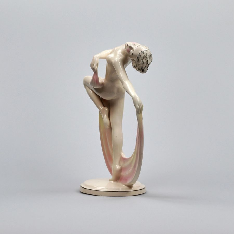 Antique Figurine of a dancer in the Art Deco style.