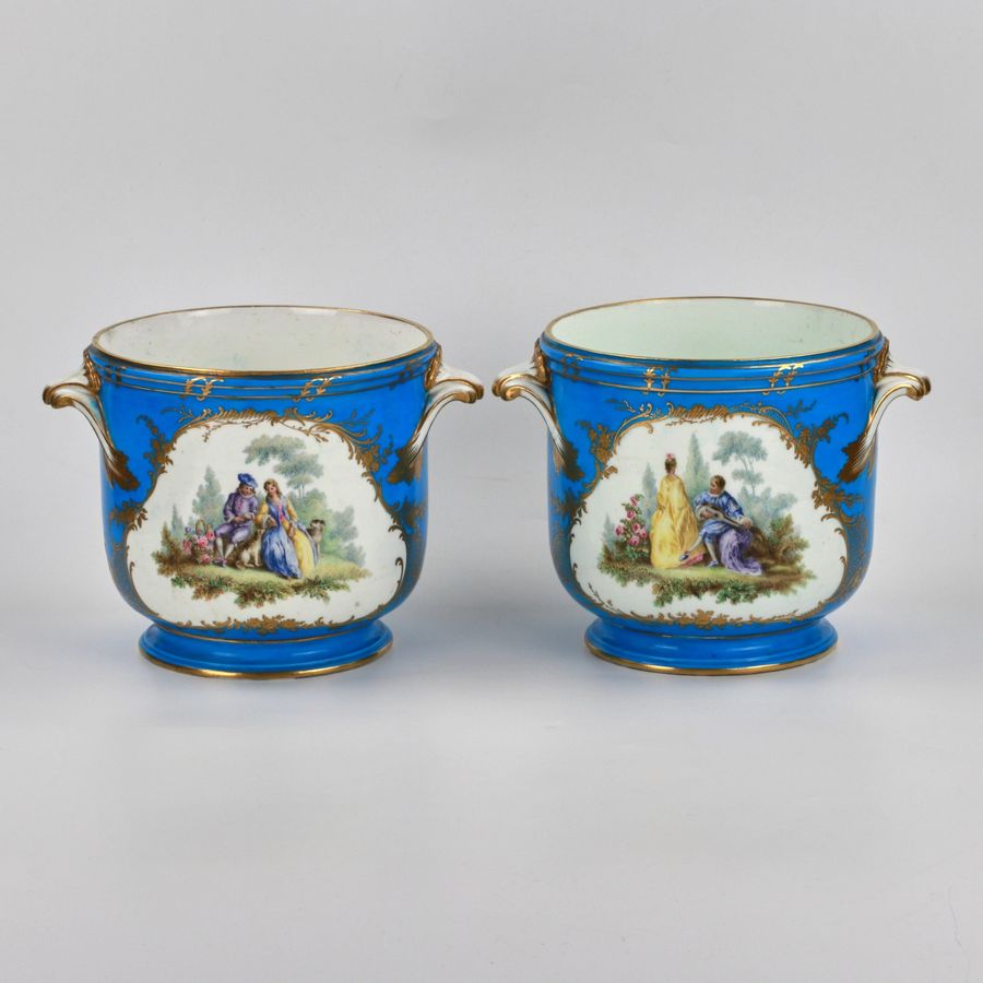 A pair of Sevres cachepots