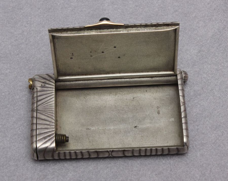 Antique Silver case with lighters