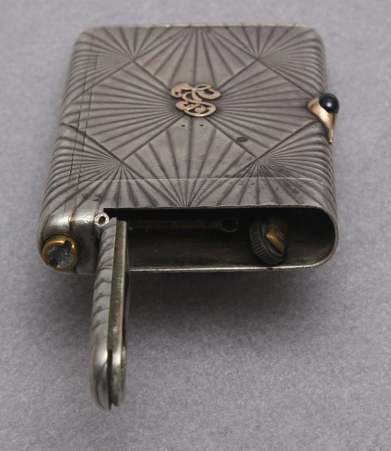 Antique Silver case with lighters