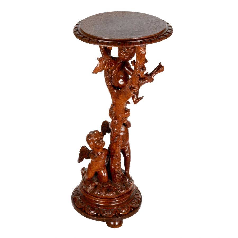 Antique Wooden console with carved cupids.