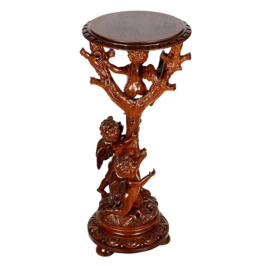 Antique Wooden console with carved cupids.