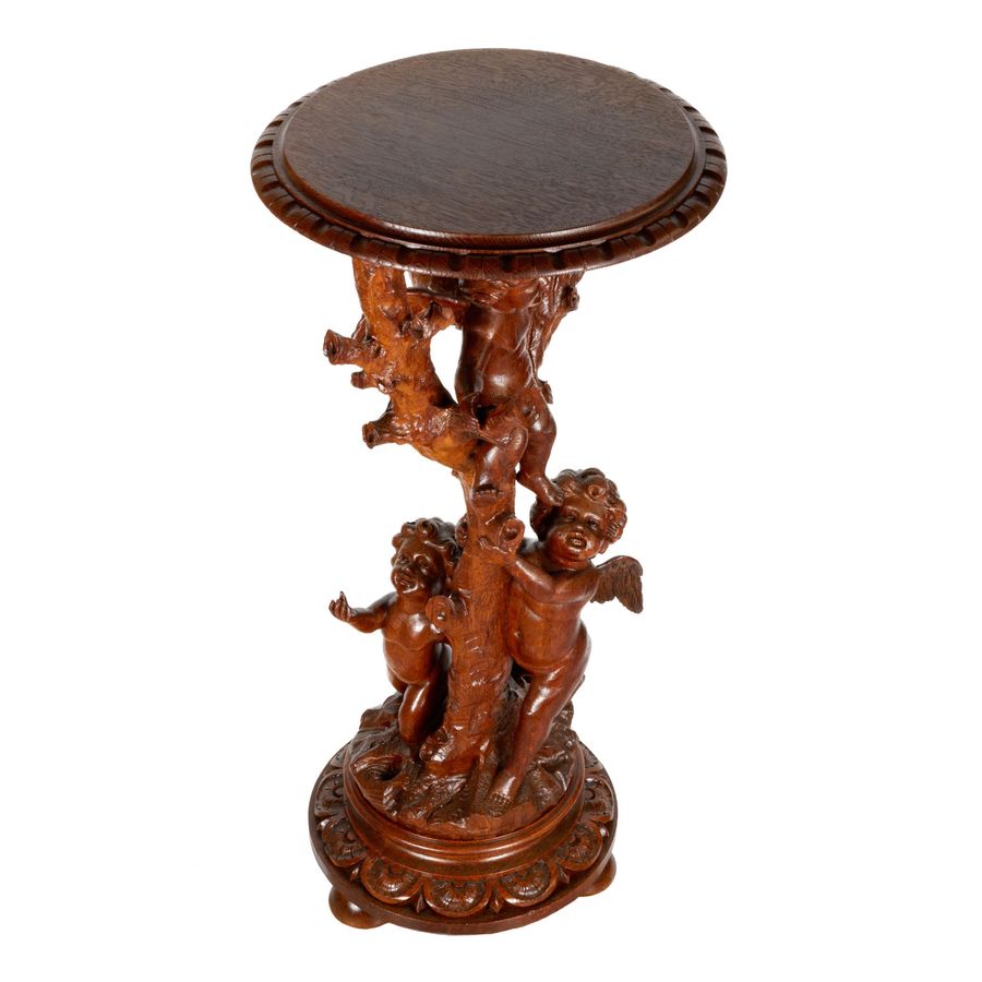 Antique Wooden console with carved cupids.