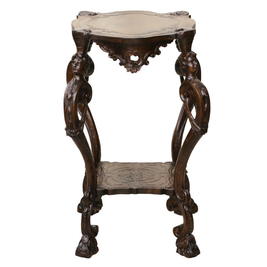 Antique Carved wooden table in neo-Rococo style from the turn of the 19th century.