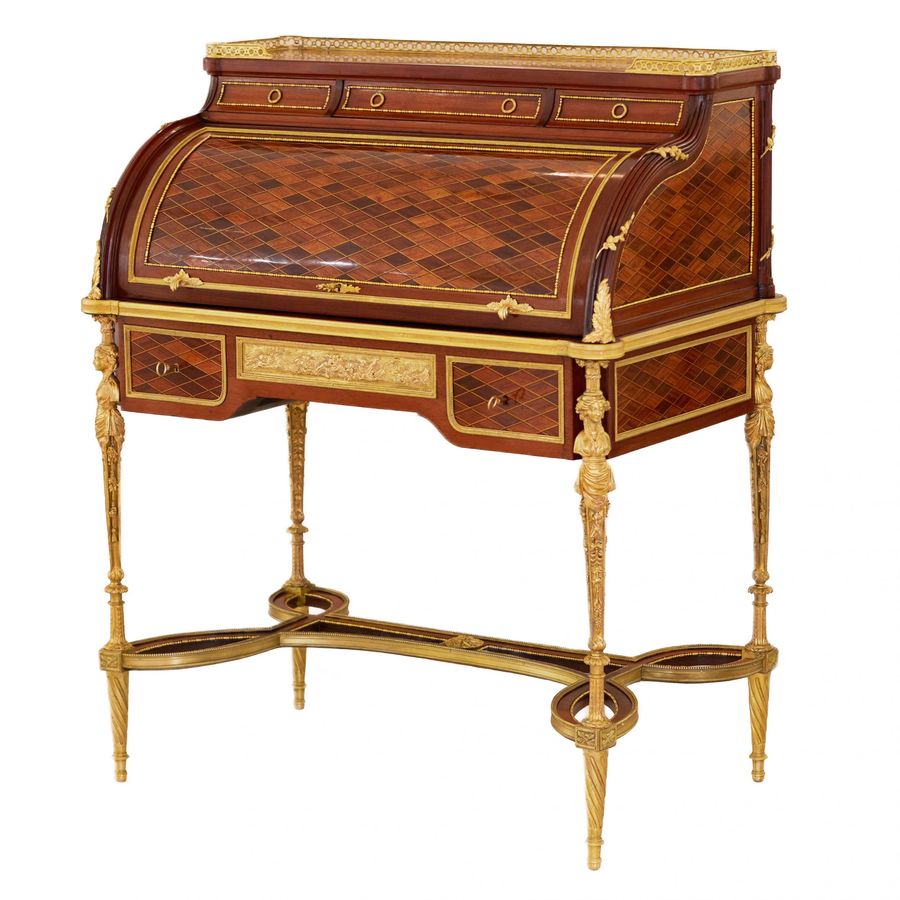 Antique E.KAHN. A magnificent cylindrical bureau in mahogany and satin wood with gilt bronze.