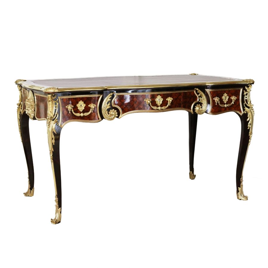 Antique Magnificent writing desk in wood and gilded bronze, Louis XV style.