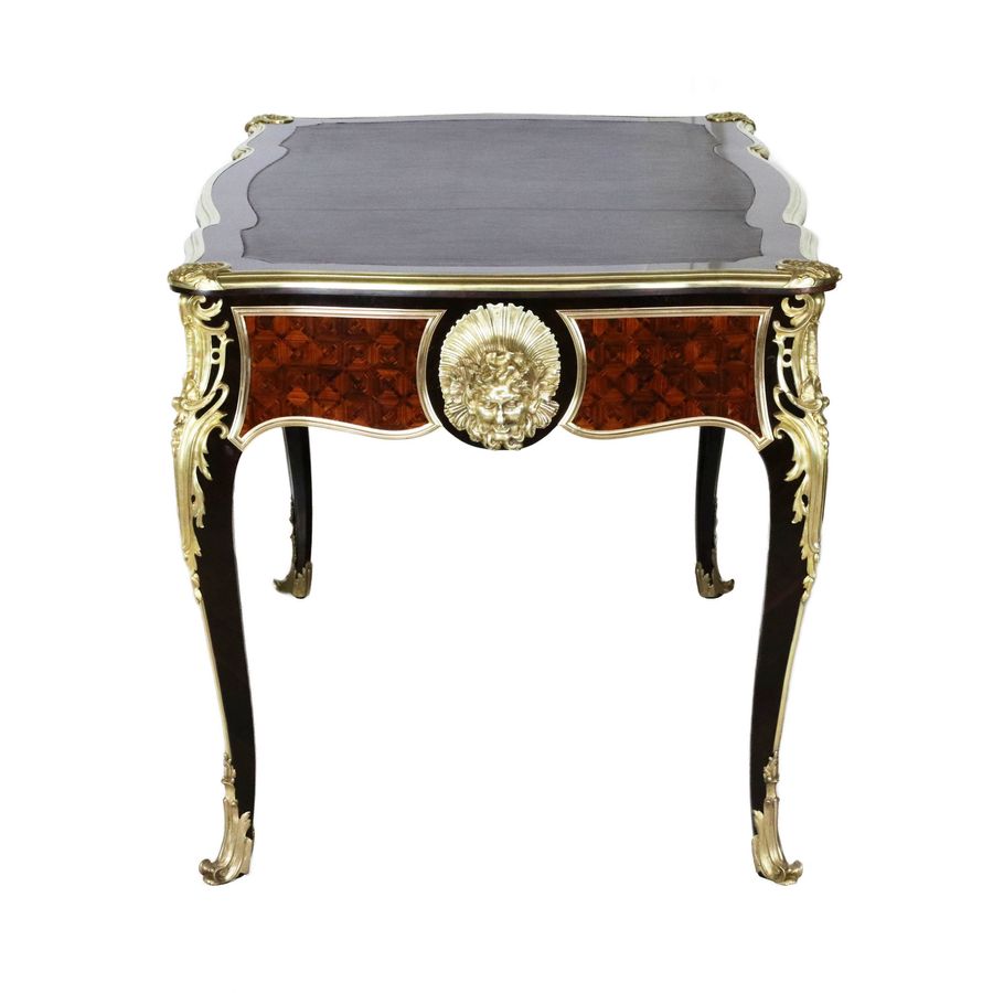 Antique Magnificent writing desk in wood and gilded bronze, Louis XV style.