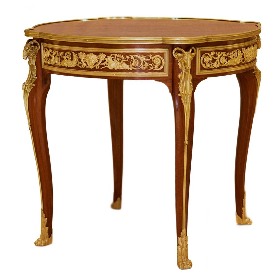 Antique Mahogany table decorated with marquetry in the style of Louis XV, Francois Linke. Late 19th century