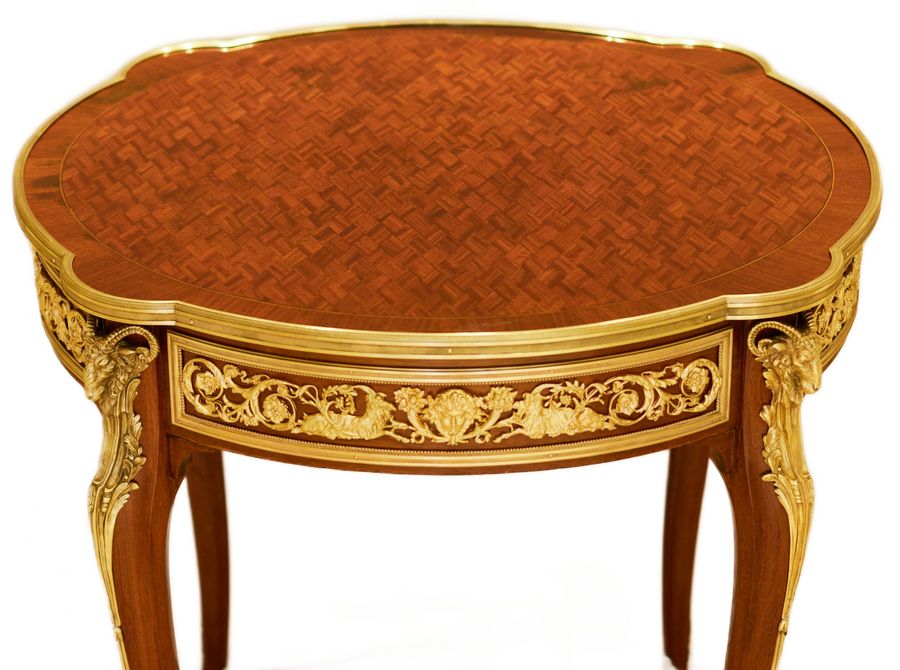 Antique Mahogany table decorated with marquetry in the style of Louis XV, Francois Linke. Late 19th century