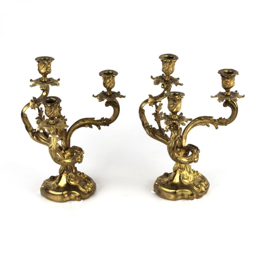 Antique Pair of gilded bronze rocaille candelabra.