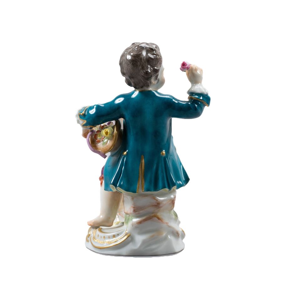 Antique Boy with flowers. Meissen.