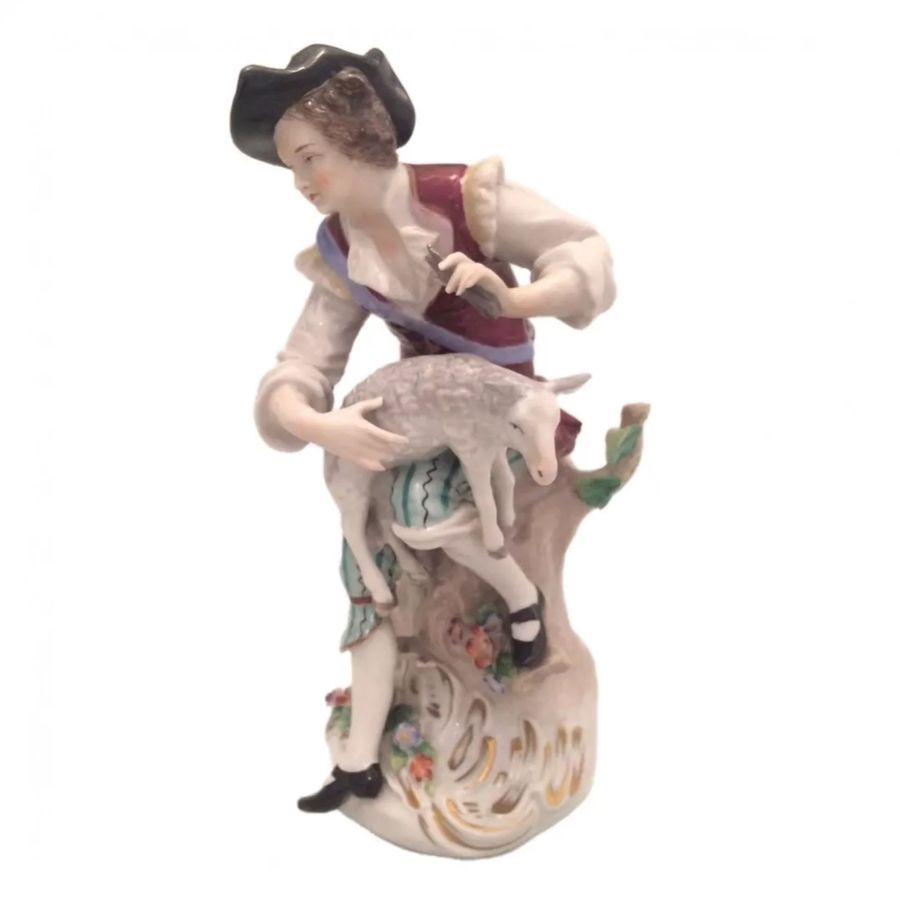 Antique Porcelain figurine Sheep shearing.