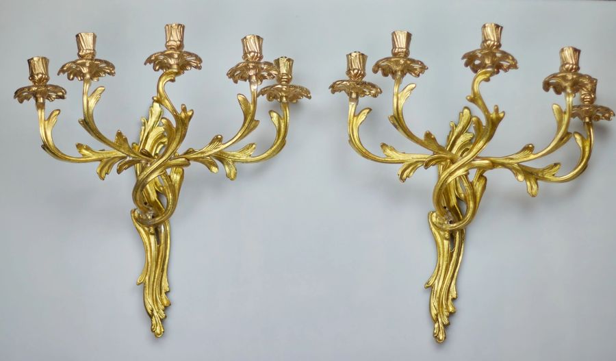 Antique Pair of bronze sconces. The turn of the 19th and 20th centuries.