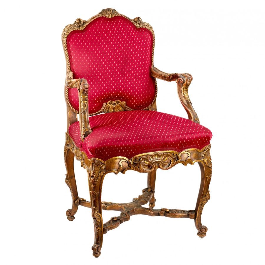 Antique Magnificent, carved chair in the Rococo style of the 19th-20th centuries.