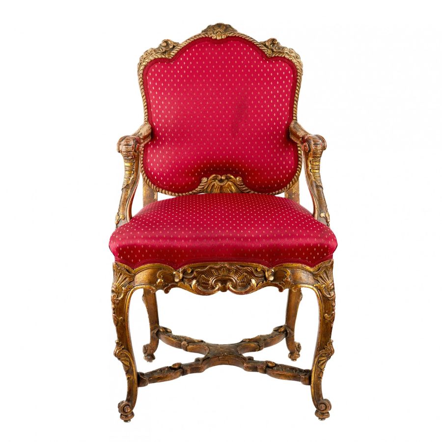 Antique Magnificent, carved chair in the Rococo style of the 19th-20th centuries.