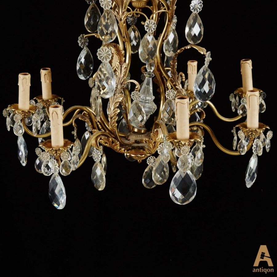 Antique Eight-candle chandelier in the Rococo style. France. Early 20th century.