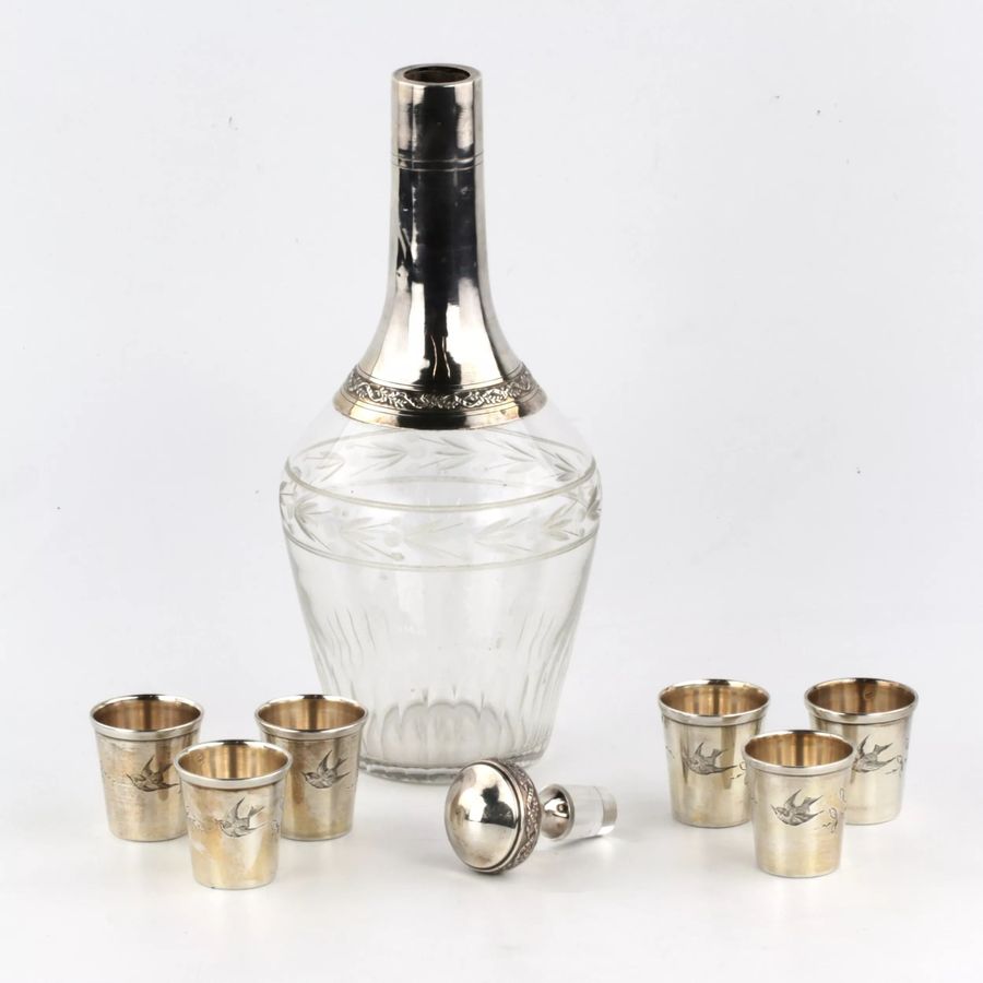 Antique A set of glasses with a carafe