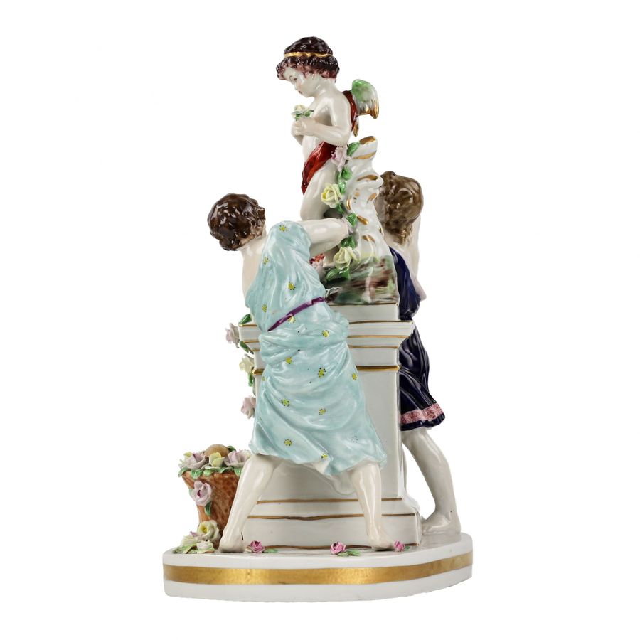 Antique Porcelain group Young people with Cupid.