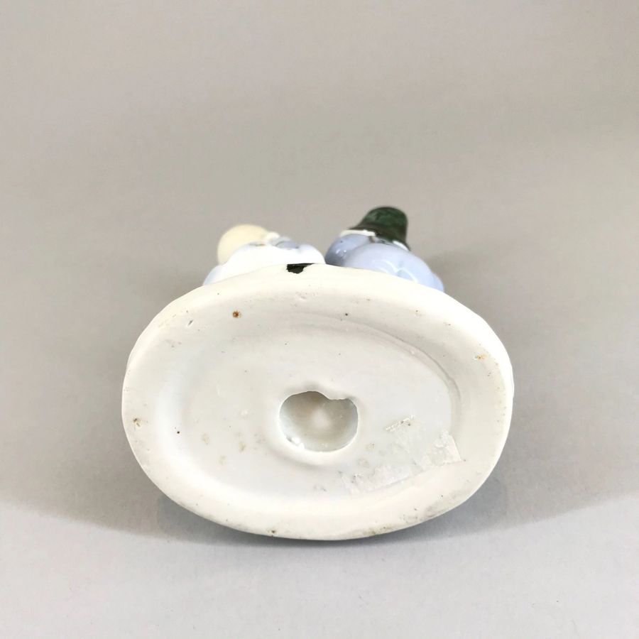 Antique Porcelain figurine 