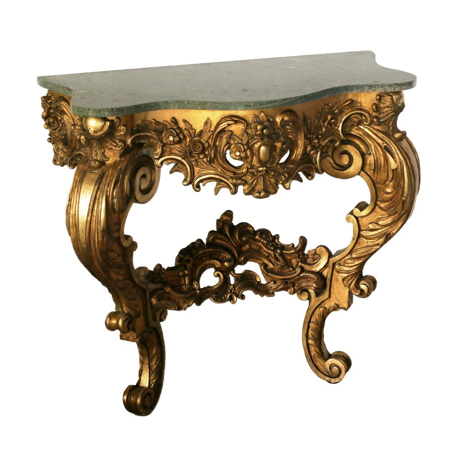 Antique Wooden, gilded console of the 19th century.