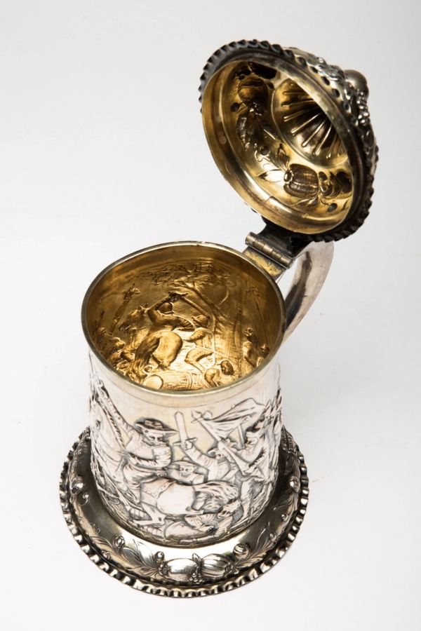 Antique Silver beer goblet with battle scenes. First half of the 19th century.