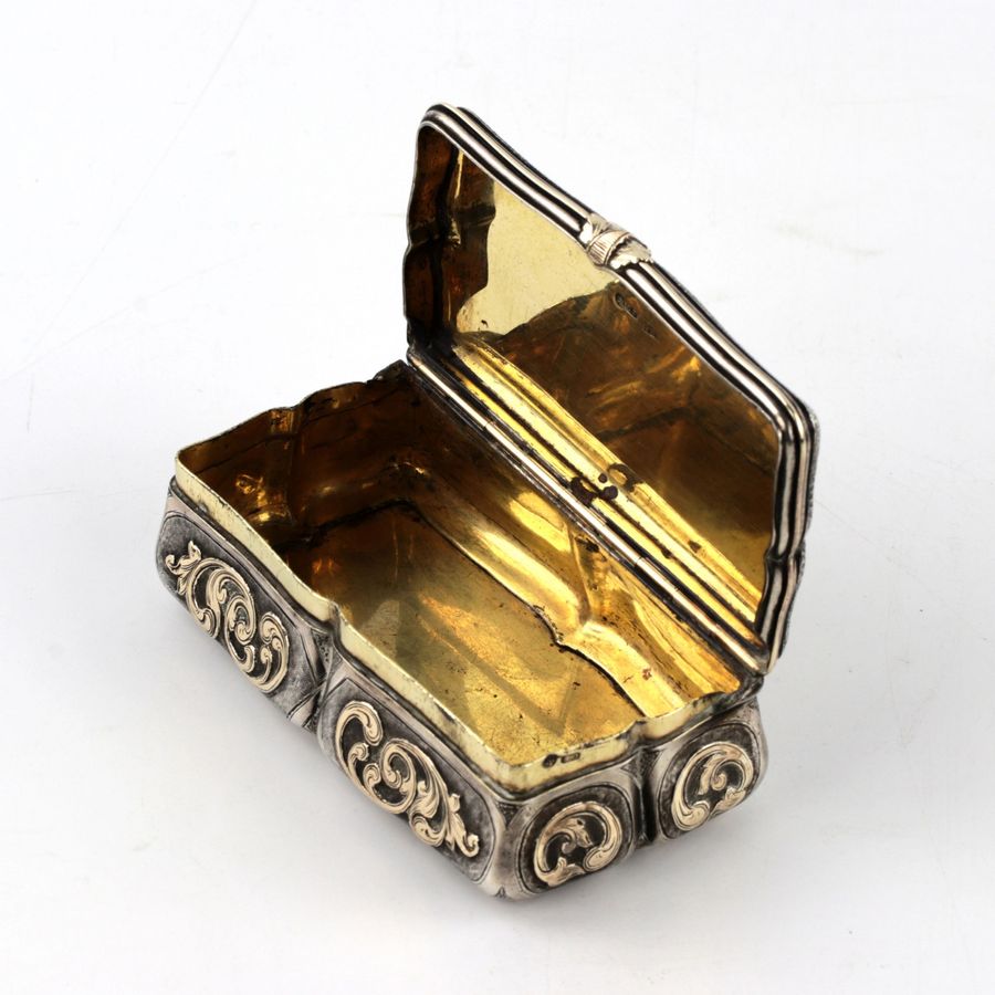 Antique Russian silver snuffbox with gold decor. Mid 19th century.