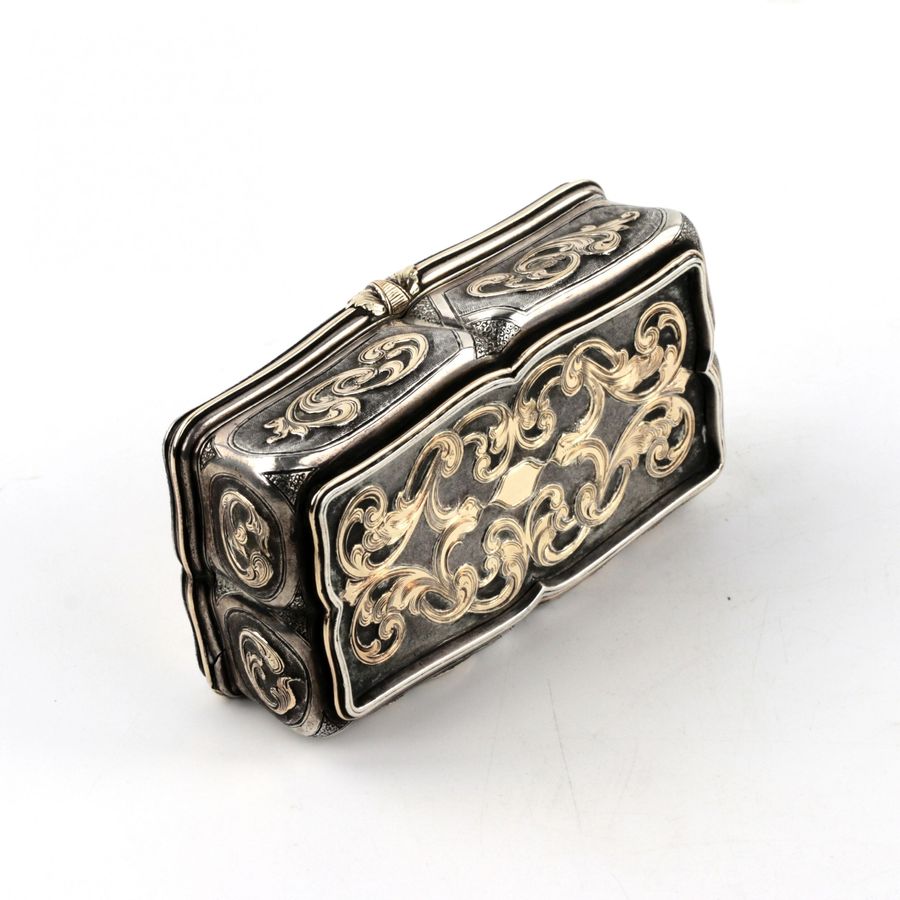 Antique Russian silver snuffbox with gold decor. Mid 19th century.