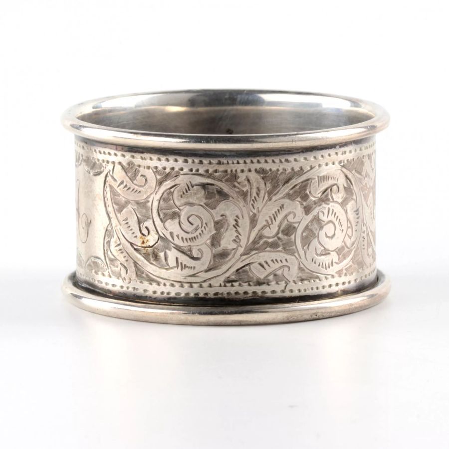 Antique Six English silver napkin rings, in an original case.