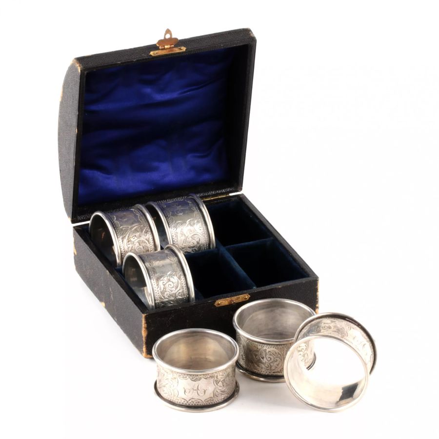 Antique Six English silver napkin rings, in an original case.