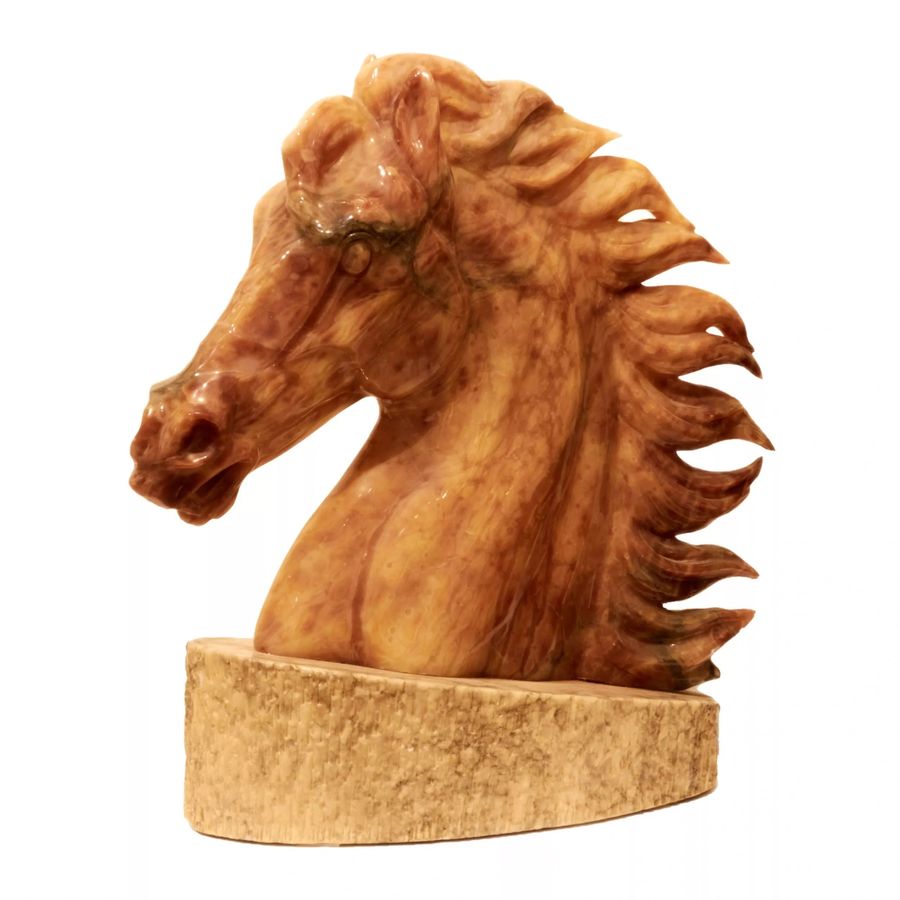 Antique Horse head on a pedestal.