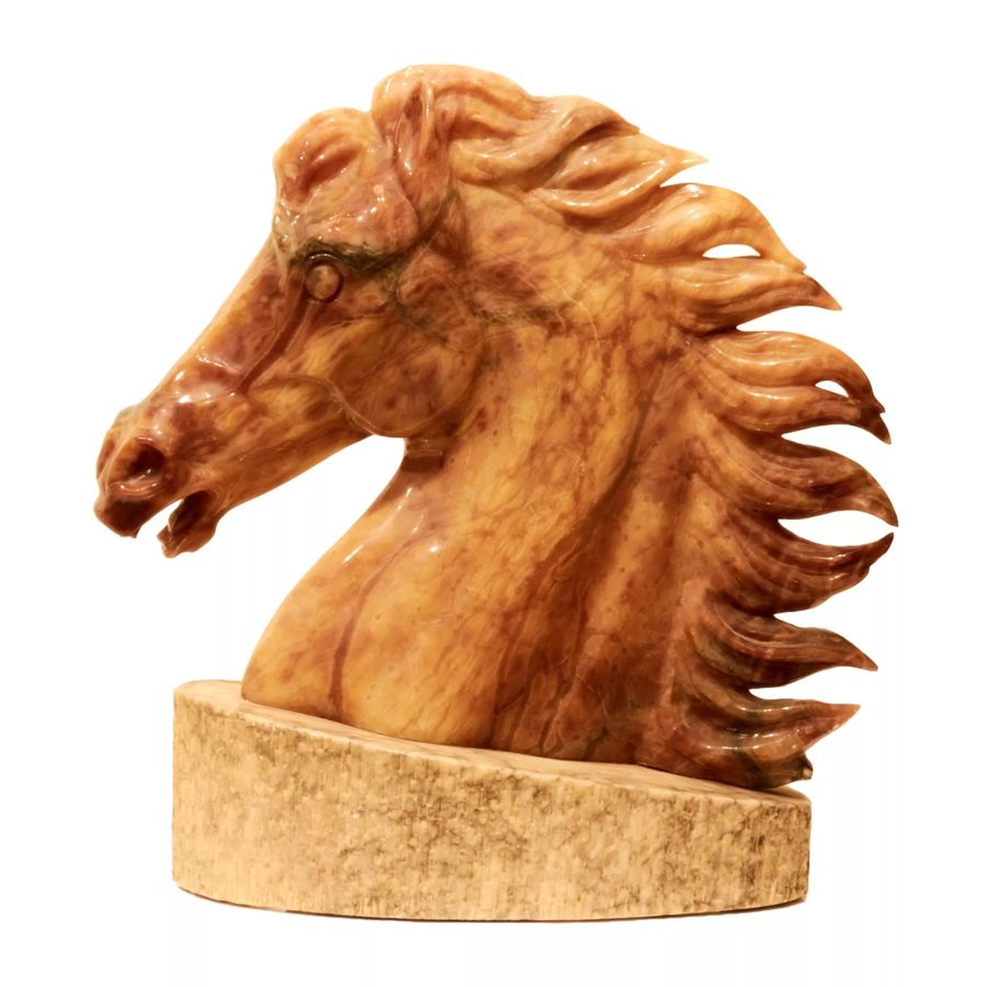 Antique Horse head on a pedestal.