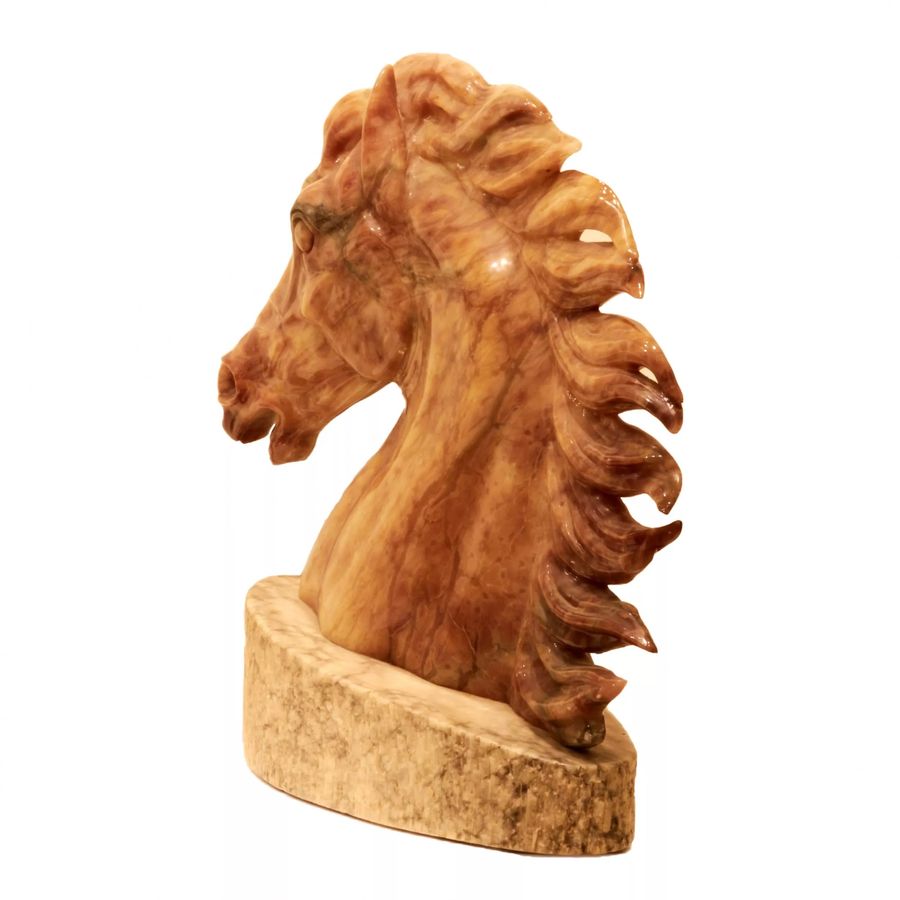 Antique Horse head on a pedestal.