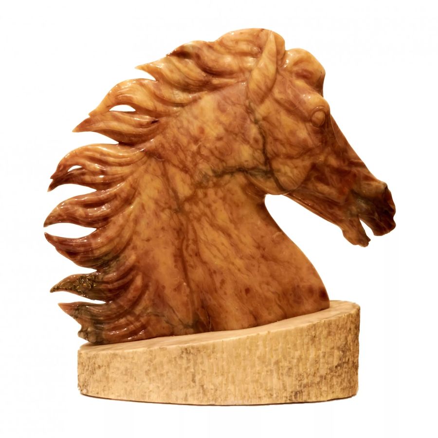 Antique Horse head on a pedestal.