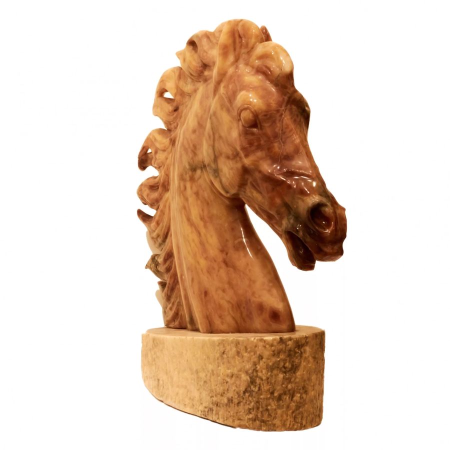 Antique Horse head on a pedestal.