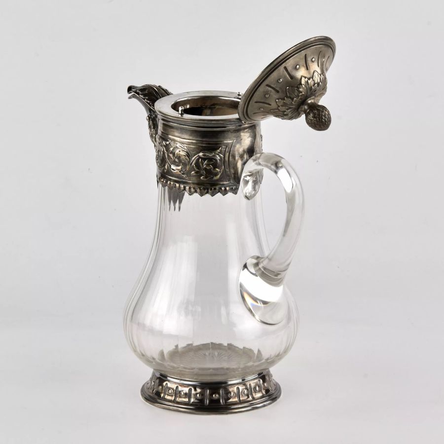 Antique Wine jug, glass in silver.