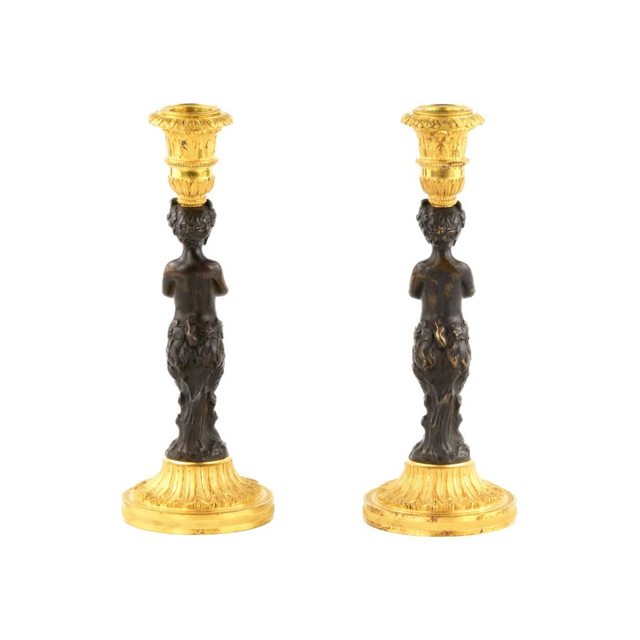 Antique Pair of bronze, French candlesticks, in the form of fauns, mid-19th century.