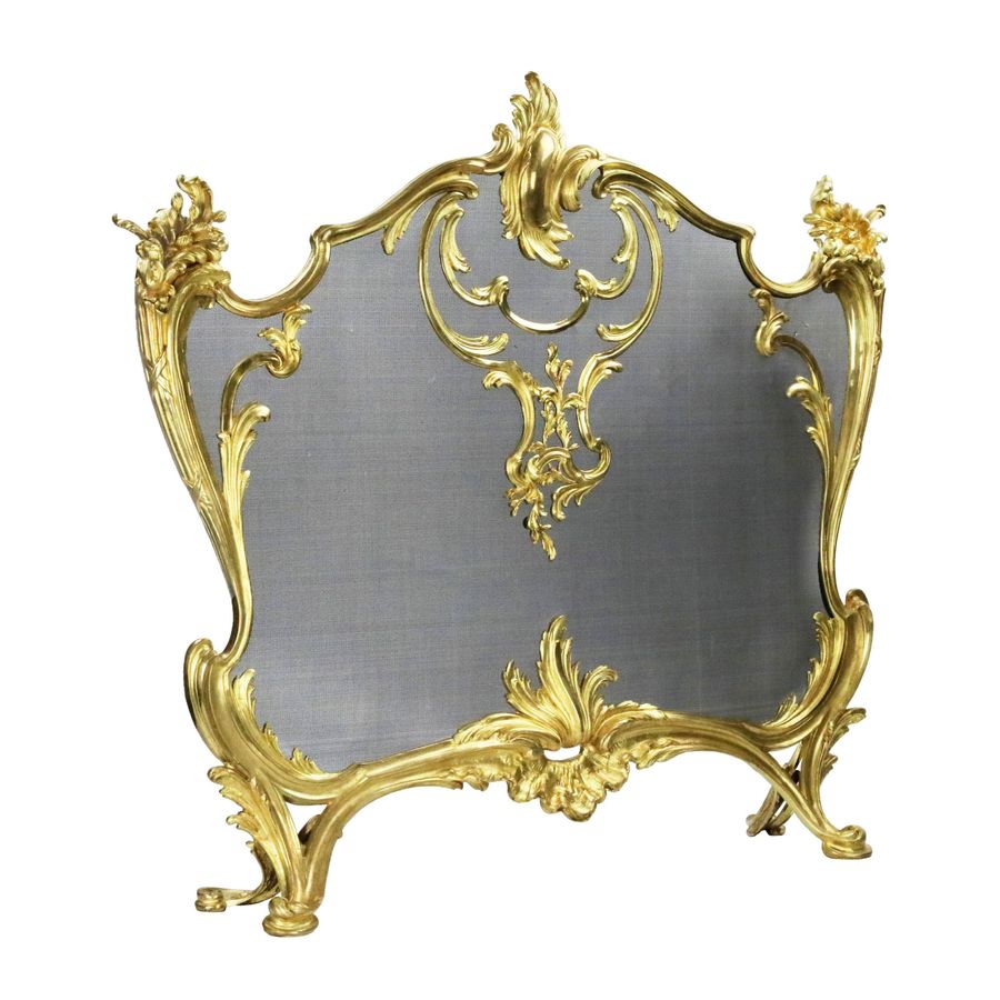 Antique Bouhon. Fireplace screen in gilded bronze with metal protective mesh, Louis XV style.