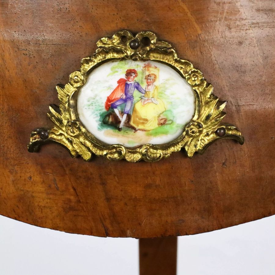 Antique Console table with porcelain medallions and brass-bronze decor, third rococo style.