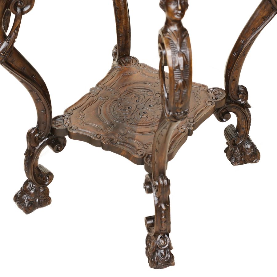 Antique Carved wooden table in neo-Rococo style from the turn of the 19th century.