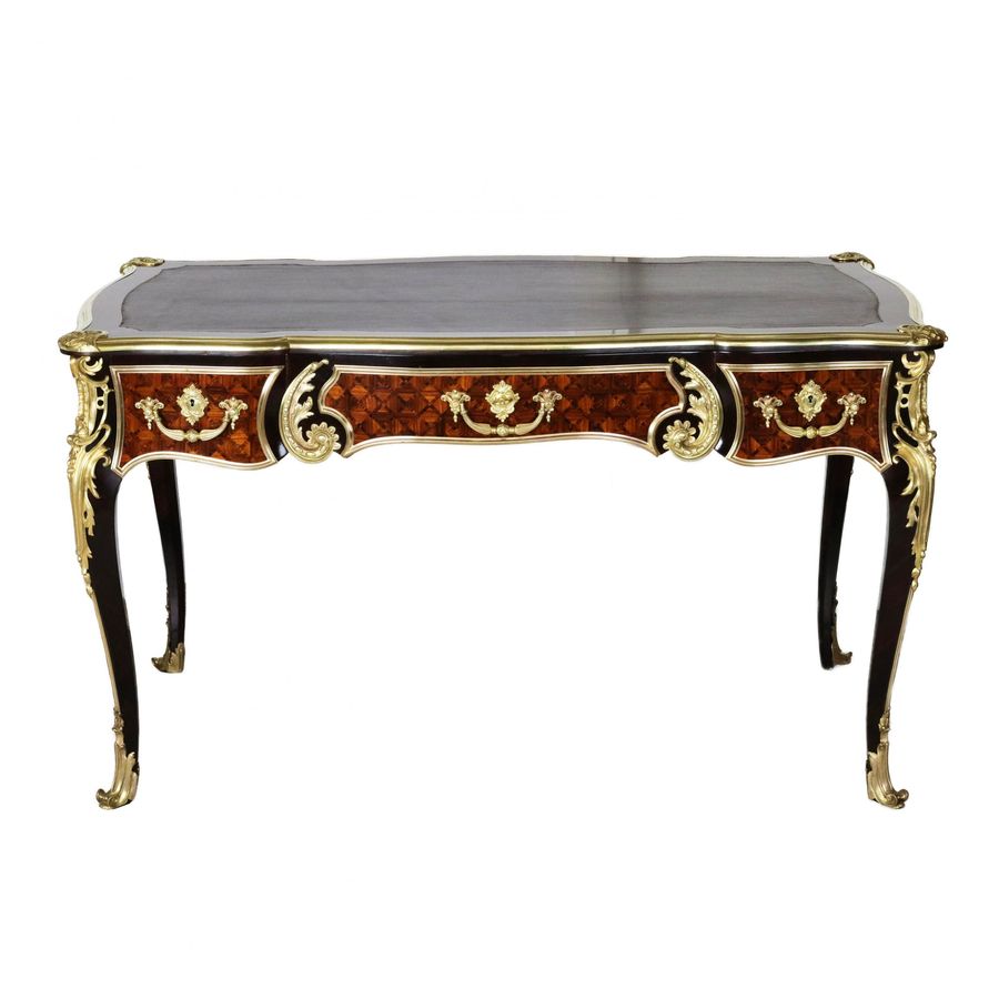 Antique Magnificent writing desk in wood and gilded bronze, Louis XV style.