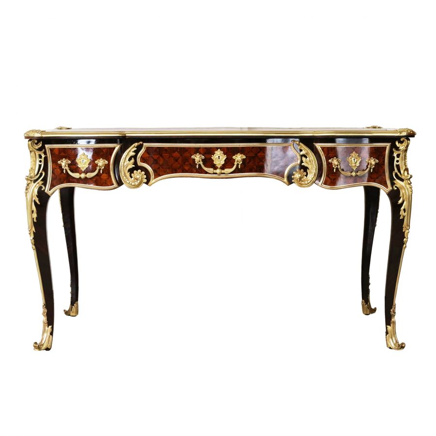 Antique Magnificent writing desk in wood and gilded bronze, Louis XV style.