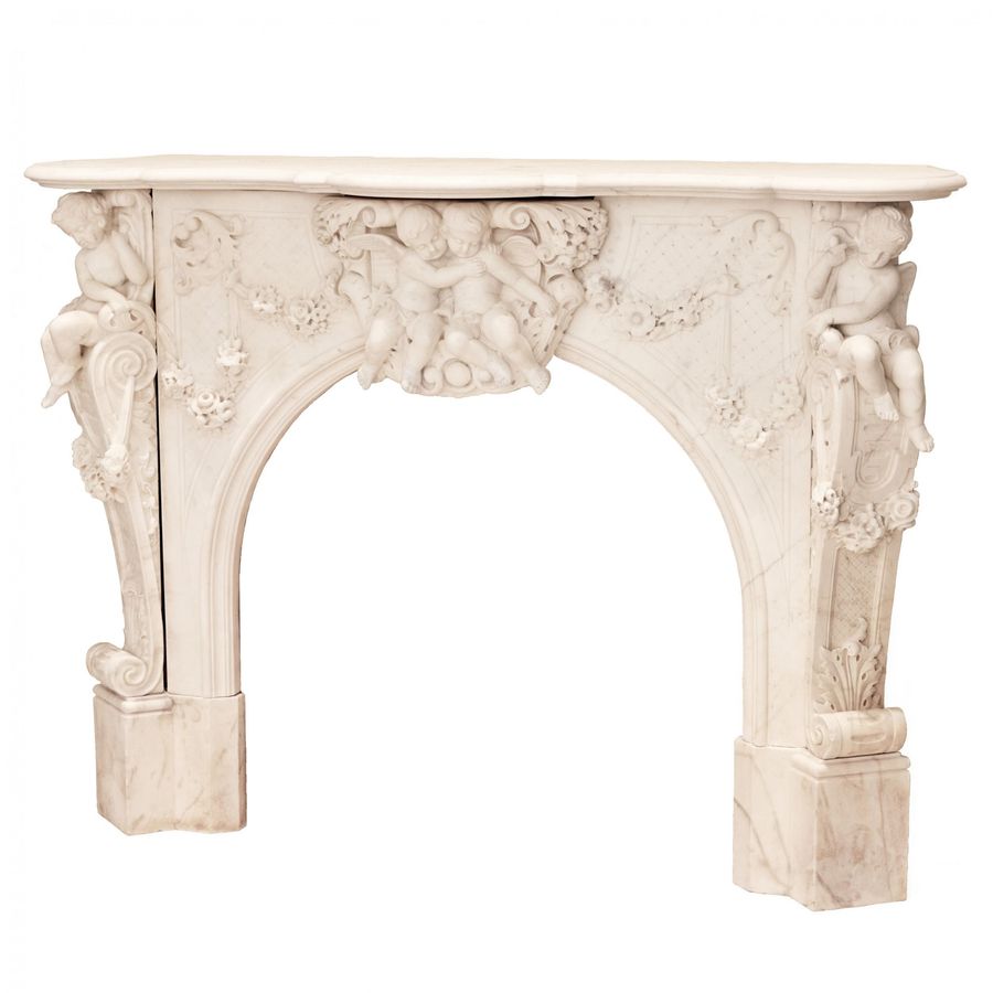 Antique French white marble fireplace with cupids, Louis XV style. 19th century