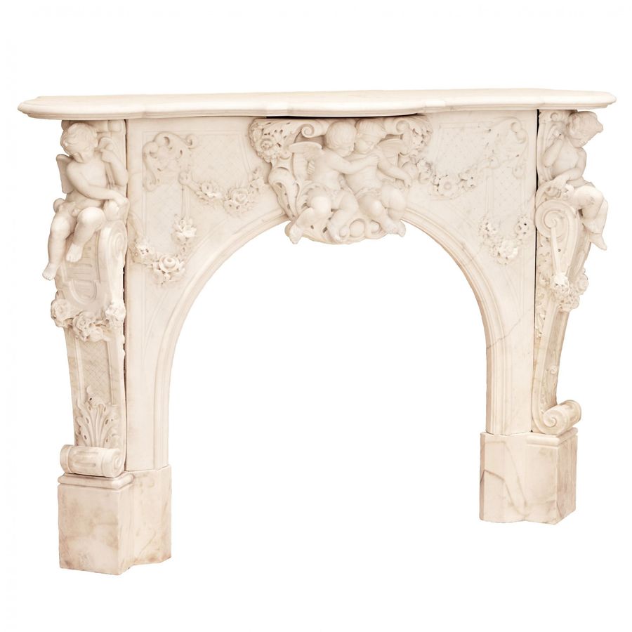 Antique French white marble fireplace with cupids, Louis XV style. 19th century