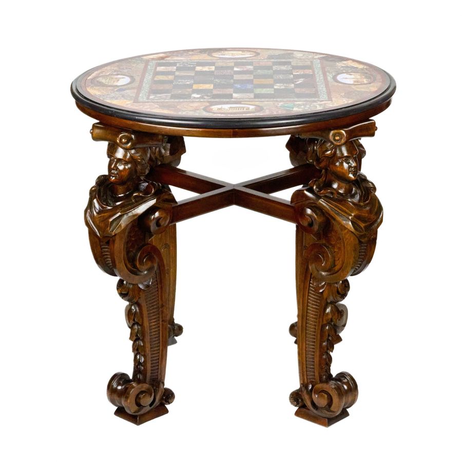 Antique An impressive chess table with precious Roman mosaics on carved legs.