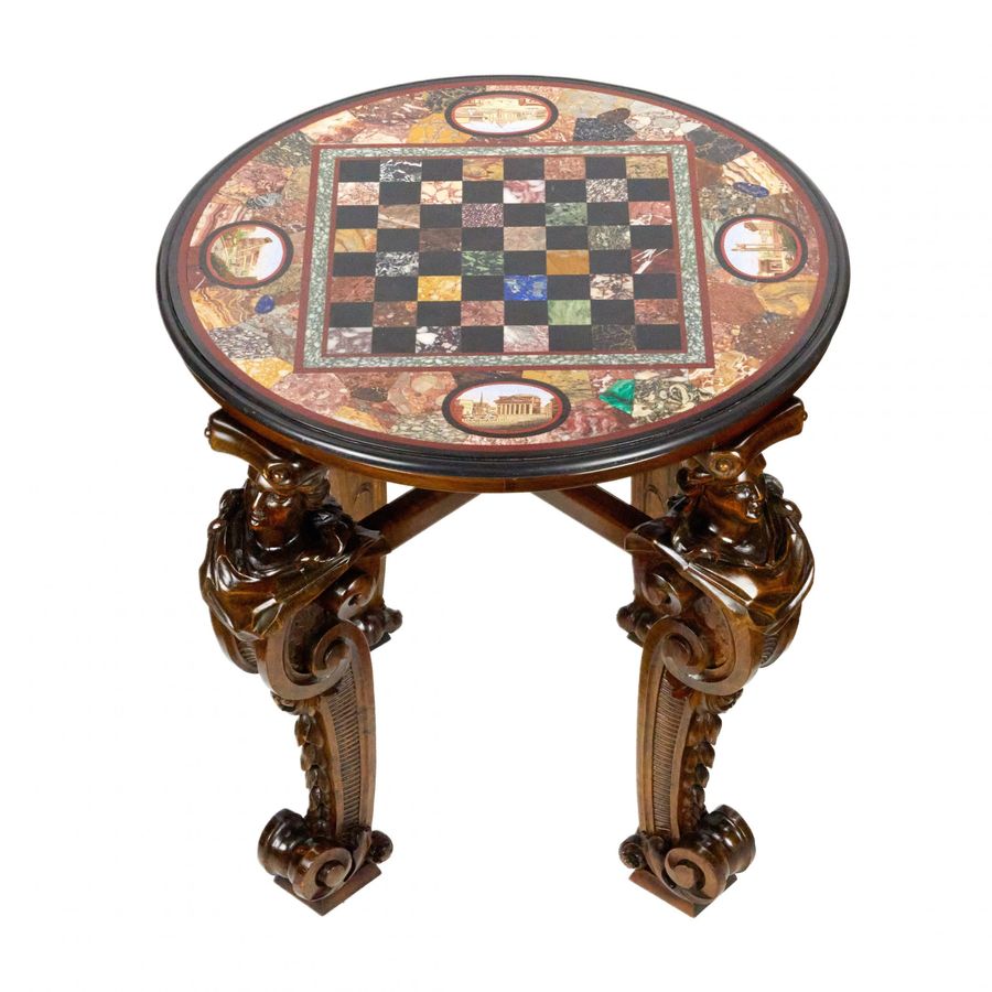 Antique An impressive chess table with precious Roman mosaics on carved legs.