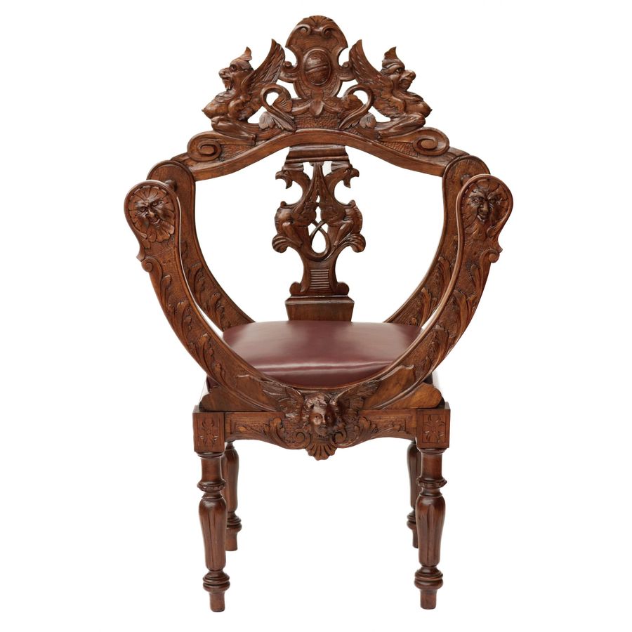 Antique Carved, richly decorated walnut chair. 19th century