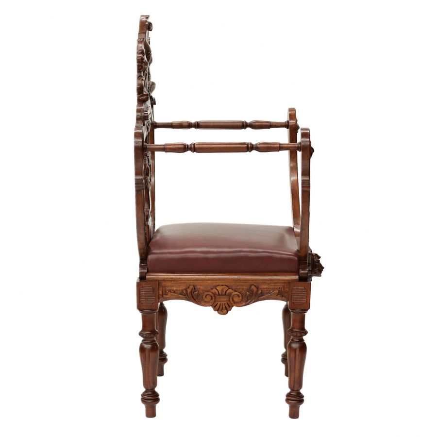 Antique Carved, richly decorated walnut chair. 19th century