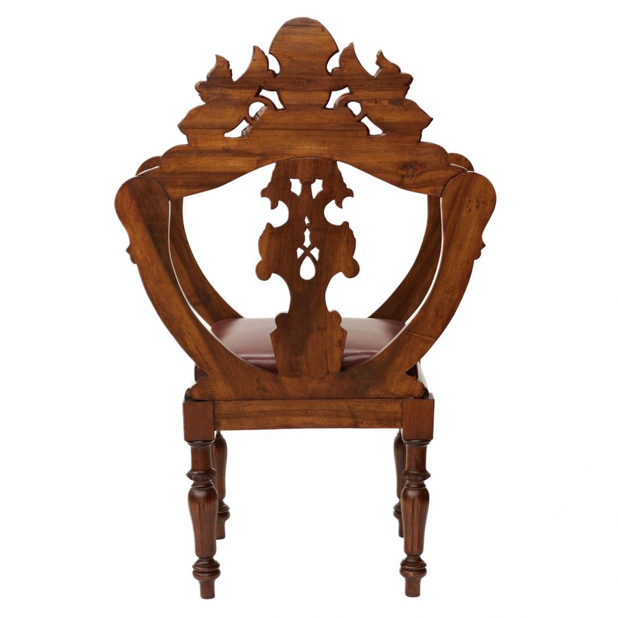 Antique Carved, richly decorated walnut chair. 19th century